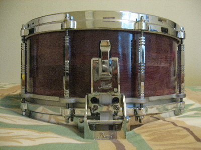 Purpleheart segmented Global drum shell Water base finish.JPG